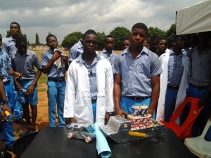 Okeke Simon and Stanley Madu displaying their fabricated    truck and ship