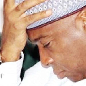 Saraki hand on forehead