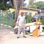 Eze with some of his belongings after his eviction
