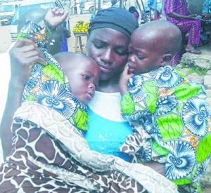 Child malnutrition pix 2 (Malnourished Taiwo and Kehinde with their mum
