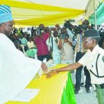 Governor Amosun congratulating Adekoya