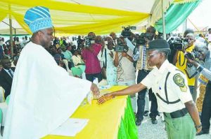 Governor Amosun congratulating Adekoya