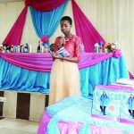 Ijeoma reading from her book