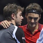 233369EB00000578-2837796-Wawrinka_left_and_Federer_hug_after_their_ATP_World_Tour_Finals_-19_1416237989443