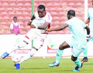 Bobby Clement of Rangers against Hussaini Isah of Niger Tornadoes copy