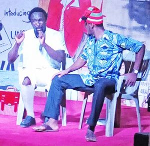 Chukwumerije (L) on stage