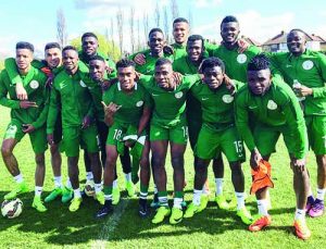 Super Eagles players after Tuesday training at the Hive Branet FC Stadium in London yesterday
