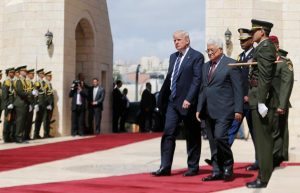 U.S. President Donald Trump and Palestinian President Mahmoud Abbas review the honor guard during a reception ceremony at the presidential headquarters in the West Bank town of Bethlehem