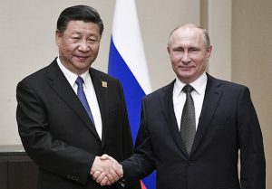645×450-putin-xi-hail-close-russia-china-ties-at-shanghai-bloc-summit-1496933757141