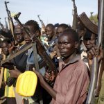 Jikany Nuer White Army fighters holds their weapons in Upper Nile State, South Sudan