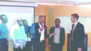 Odusami With Mic, Strohle (r) with other participants at the event.