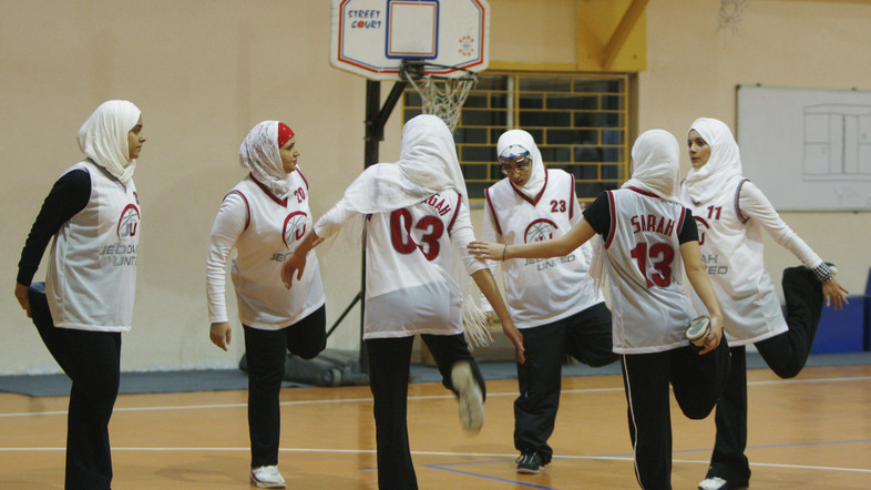 Saudi Arabia’s Jeddah United warm up before their friendly basketball game against Jordan’s Al Reyadeh in Amman