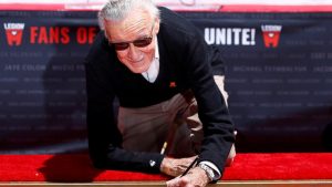 Marvel Comics co-creator Lee places his signature in cement during a ceremony in the forecourt of the TCL Chinese theatre in Los Angeles