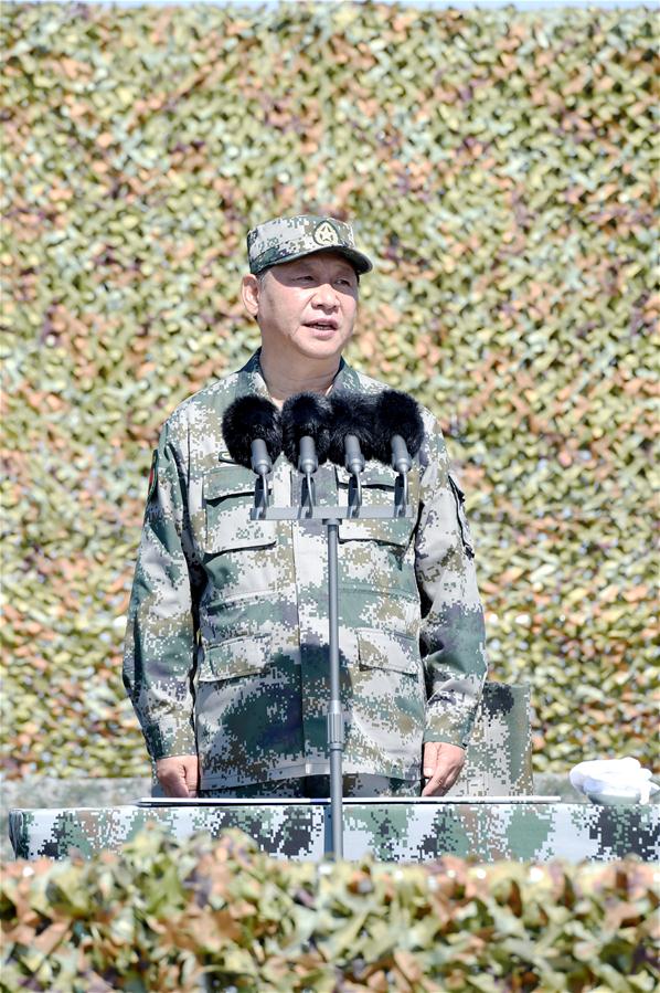 xi inspects