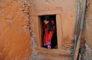 TO GO WITH Nepal-women-religion-society-