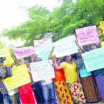 WOMAN PROTESTS