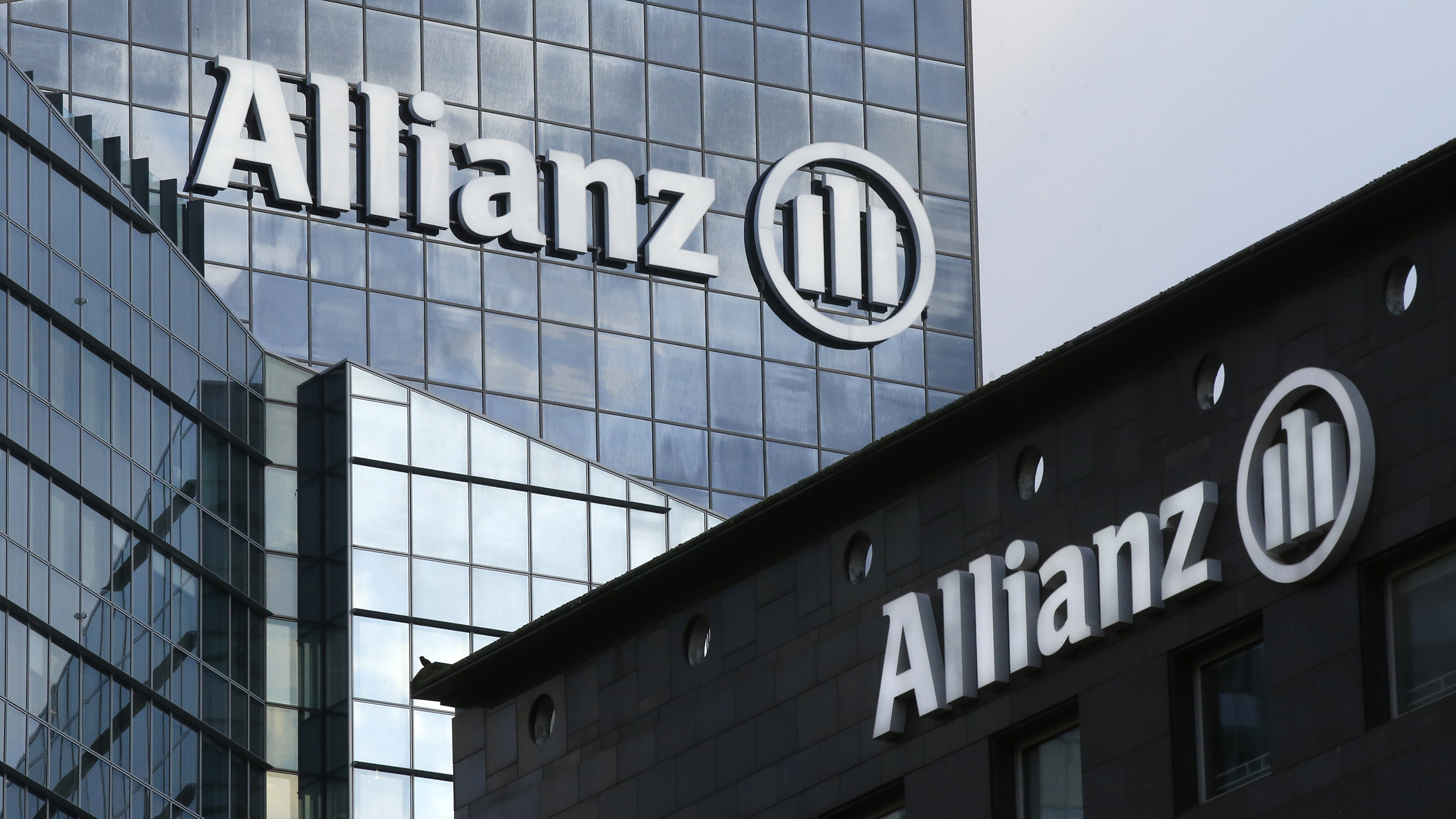 The logo of Europe’s biggest insurer Allianz SE is seen on the company tower at La Defense business and financial district in Courbevoie