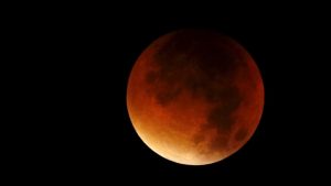 A supermoon is seen in the sky in Colmar