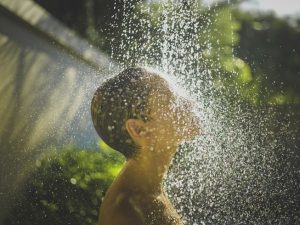 woman-taking-shower-outside.jpg.653x0_q80_crop-smart