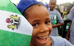 A-Nigerian-school-girl-with-Nigeria’s-flag