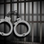 Prison-Bars-and-Cuffs