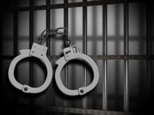 Prison-Bars-and-Cuffs