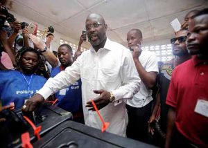 George Weah Casting his vote