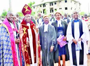 Bishop Monday Nkwoagu of Abakaliki Diocese (2nd L); former Minister of Power, Prof. Chinedu Nebo and diocesan officials during the synod held at Emmanuel Church, Azuiyiokwu