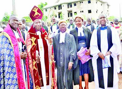 Bishop Monday Nkwoagu of Abakaliki Diocese (2nd L); former Minister of Power, Prof. Chinedu Nebo and diocesan officials during the synod held at Emmanuel Church, Azuiyiokwu