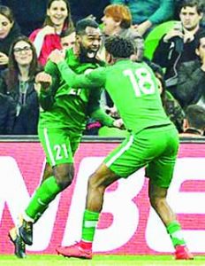Brian Idowu and Alex Iwobi celebrating the demolition of the star studded Argentina team yesterday in Krasnodar, Russia copy