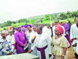 Primate Church of Nigeria, Anglican Communion, Most Rev Nicholas Okoh unveiling the plaque for the Mega Auditorium of Camp of Li