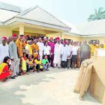 Traditional ruler of Awba Ofemili, Igwe Ezekwesili Maduagwuna (M), Local government representatives, members of the Church of Jesus Christ of Later-day Saints in a group photograph with other