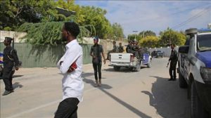 Somalian security forces take measures at the scene after the suicide attack