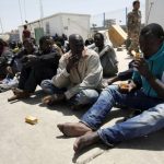 Illegal migrants who attempted to flee the coast to Europe are seen at the Libyan Navy base in the the coastal city of Tripoli