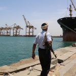 FILE PHOTO: Soldier walks at Red Sea port of Hodeidah, Yemen