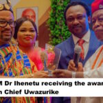 HRM Dr Ihenetu receiving the awards from Chief Uwazurike