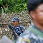 Polices guard near a bridge after Arakan Rohingya Salvation Army (ARSA) attacked, in Buthidaung