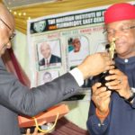 Anambra State Deputy Governor, Dr Nkem Okeke receiving the award as Most Amiable and Loyal Deputy Governor and a worthy friend of NIFST from Prof M. O. Iwe