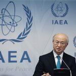 IAEA Director General Amano addresses a news conference after a board of governors meeting at the IAEA headquarters in Vienna