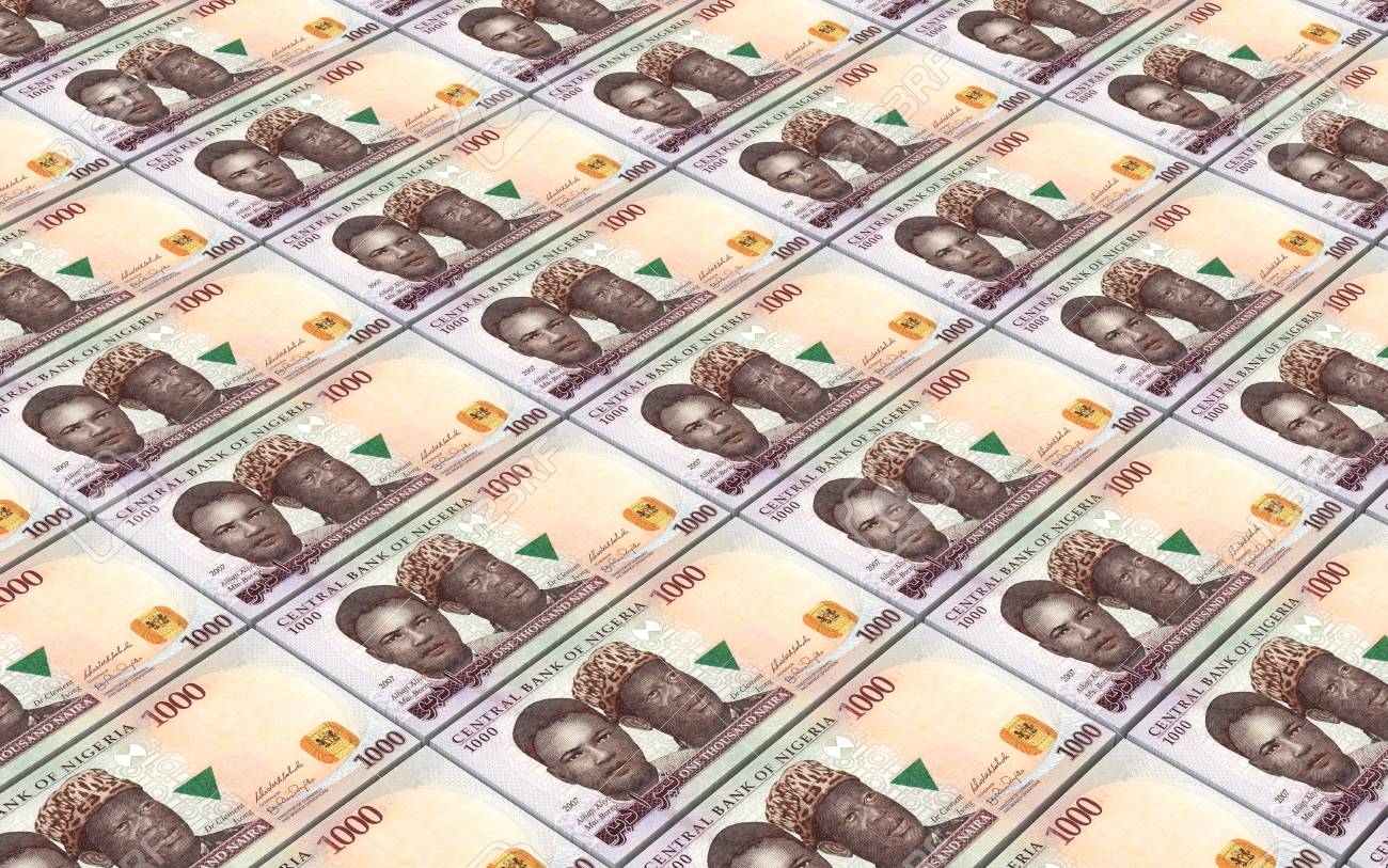 42923746-nigerian-nairas-bills-stacks-background-