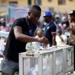 A-party-delegate-casting-his-vote