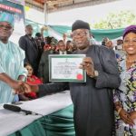 Fayemi-with-his-wife-Bisi-receives-the-Certificate-of-Return-from-INEC-National-Commissioner-Soyebi-e1531942340835