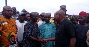 Newly elected executives of Okpoko community being congratulated by Mr Felix Onunkwo
