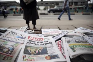 Newspapers are seen at a vendor’s stand along a road in Ikoyi district in Lagos