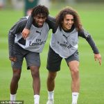 Alex-Iwobi-and-Mateo-Guendouzi-