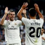 FILE PHOTO: Real Madrid’s Gareth Bale celebrates with Marco Asensio at Santiago Bernabeu, Madrid, Spain – August 19, 2018