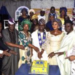 Lion Babalola middle with others during his public presentation