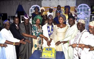 Lion Babalola middle with others during his public presentation