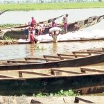 OFFLOADING OF BAGS OF RICE SMUGGLED THROUGH RIVER DOLE-KAINA