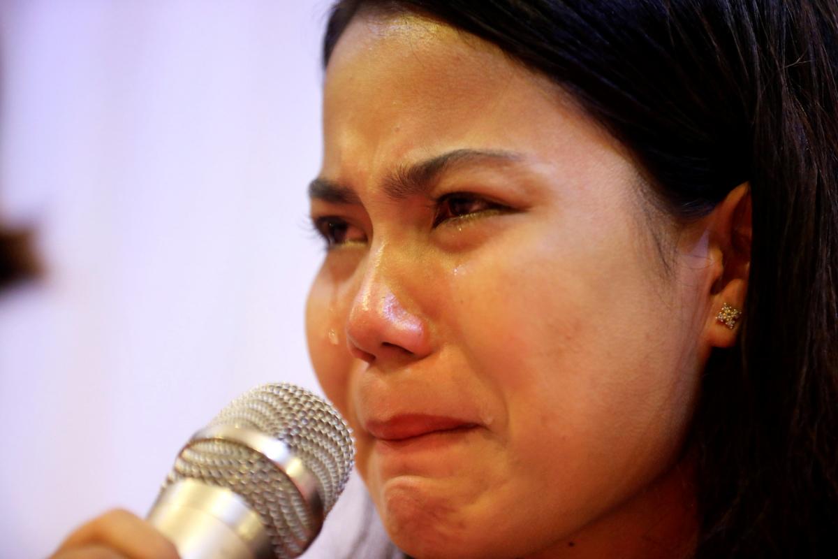 Chit Su Win, wife of Reuters journalist Kyaw Soe Oo talks to reporters during family and lawyers press conference in Yangon